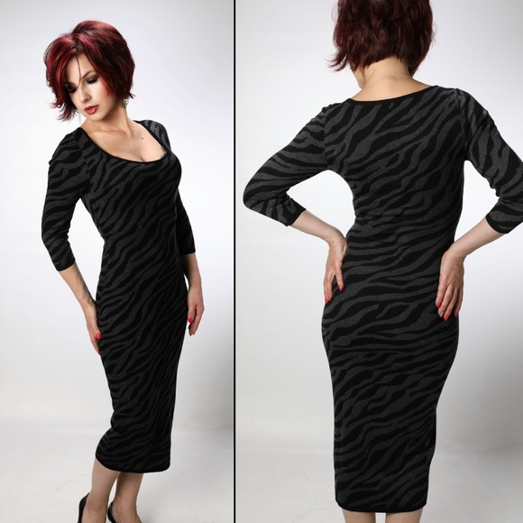 BEBE⭐️ Sweater Dress size S Animal print - Picture 2 of 3